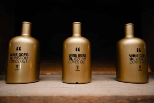 Wijnfles goud met quote " Wisdom "